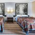 Super 8 by Wyndham Marysville/Port Huron Area room with two beds and wall art in Marysville