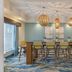 Best Western Wesley Chapel dining area with high table, stools, pendant lights, and blue patterned carpet