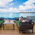 Hard Rock Hotel Maldives in Malé: oceanfront deck with two loungers, table and drinks overlooking the sea