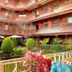 Hotel Siddhi Manakamana in Kathmandu courtyard garden with fountain and red-brick balconies