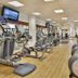 City Seasons Al Hamra Hotel in Abu Dhabi fitness center with treadmills, ellipticals and exercise bikes