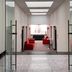 Hotel MX Forum Buenavista Cdmx lobby entrance with red seating in Mexico City