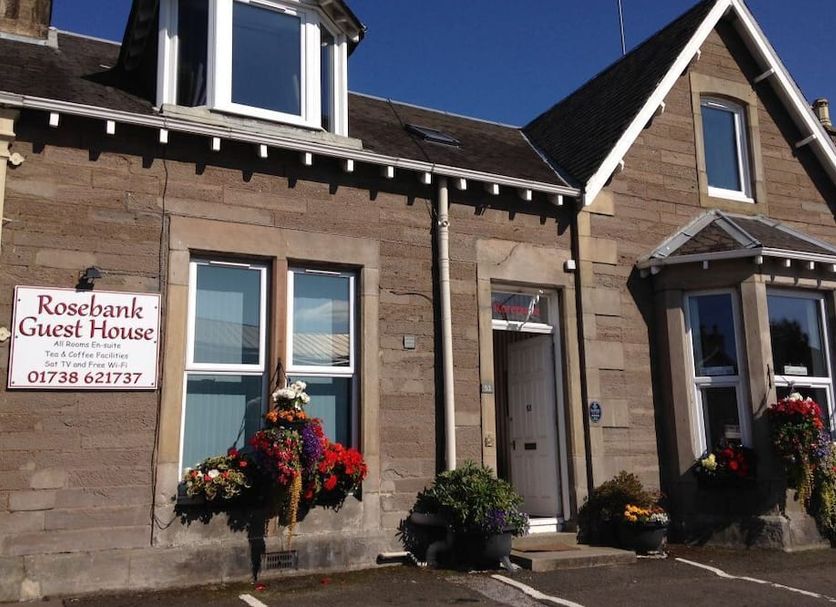 Rosebank Guest House in Perth, stone guest house exterior with flower baskets and bay windows