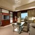 Hotel Kuva Chateau in Taoyuan City suite with living room, bedroom and city view