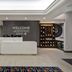 Hampton Inn New York-JFK lobby in Queens with reception desk and seating area