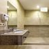 Citrus Hotel Tbilisi bathroom with granite vanity, walk-in shower and bidet