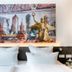 Hotel Carolinenhof Berlin room with twin beds and cityscape artwork above the headboard