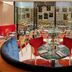 The Chancery Hotel Dublin restaurant with red velvet chairs and stone courtyard views