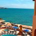 Sea of Cortez Beach Club in San Carlos with ocean-view pool terrace and beach umbrellas