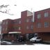 Date Business Hotel Castle in Noboribetsu, red-brick hotel exterior with parked cars