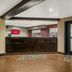 Red Roof Inn & Suites Knoxville East lobby with front desk and glass entrance in Knoxville