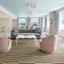 the goodtime hotel, Miami Beach lounge with striped rug, ocean view windows and pastel seating