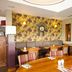 Premier Inn Edinburgh Airport - M9 Jct1 dining area with wood tables and patterned seating in Edinburgh