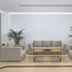 Niriides Beach in Kolympia lobby seating area with sofa, armchairs, coffee table and potted palms