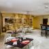 Blu Hotel by Tamaca in Santa Marta: hotel bar and dining area with tables, stools, and mosaic counter