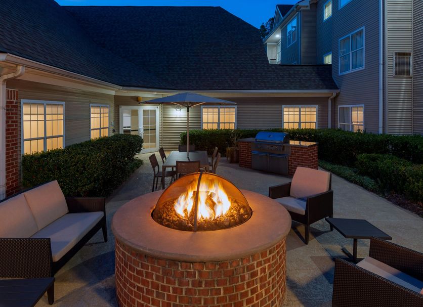 Courtyard fire pit seating at Residence Inn by Marriott Greenville-Spartanburg Airport in Greenville