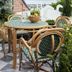 Hotel Anna & Bel rooftop terrace with wicker chairs and table in Philadelphia