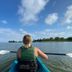 Tilghman Island Inn on Tilghman Island: guest kayaking on calm water under a blue sky