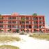 Gulf Towers Resort Motel in Indian Rocks Beach, beachfront motel with balconies and palm trees