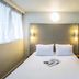 Campanile Mulhouse Sud - Morschwiller room with double bed and bunk bed in Mulhouse