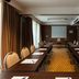 Meeting room at Delta Hotels by Marriott Olbia Sardinia in Olbia with U-shaped conference tables and projector screen