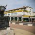 Abrivado in Saintes-Maries-de-la-Mer with bull statue in front of the hotel