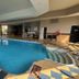 Quality Inn Saint-Jean-sur-Richelieu indoor pool with whirlpool and lounge seating