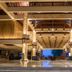 Discovery Kartika Plaza Hotel in Kuta lobby with high ceilings, columns, and open-air ocean view