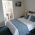 The Woodvale, Cowes: guest room with double bed and en suite bathroom doorway