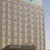 Hotel Route-Inn Omagari Ekimae in Daisen, beige high-rise hotel exterior with many windows