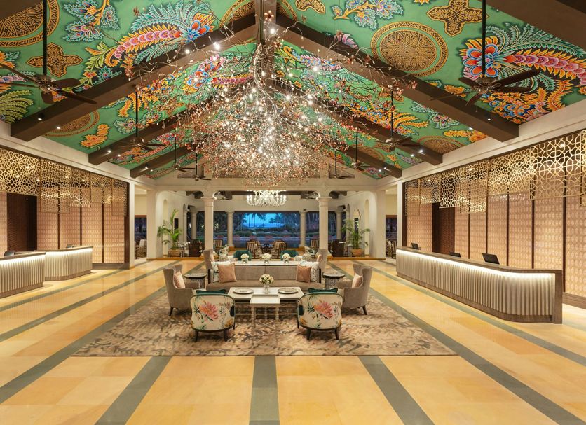 ITC Grand Goa, A Luxury Collection Resort & Spa, Goa lobby with ornate ceiling and chandeliers in Cansaulim