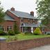 Rosdarrig Bed & Breakfast in Boyle, brick guesthouse with manicured garden and low brick wall