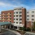 Courtyard by Marriott Greensboro Airport exterior with covered entrance and brick facade in Greensboro