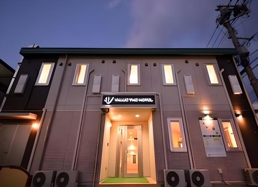 Value the Hotel Ishinomaki exterior entrance at dusk in Ishinomaki