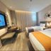 Home Inn Plus Beijing South Station Wanda Plaza guest room with two twin beds and work desk in Beijing