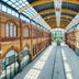Four Points by Sheraton Offenbach Plaza atrium corridor with arched brick walls and glass roof