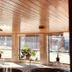 Amber's Inn & Suites in Wisconsin Dells lobby with large windows, potted plants and patio seating
