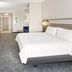 Holiday Inn Express & Suites Chicago West-O'hare Arpt Area By IHG guest room with king bed and TV