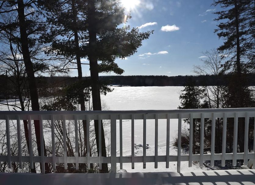 Lakeside Bed & Breakfast in Florence with a snowy lake view from a balcony