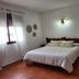 Hostal Rural La Plata Parking Incluido bedroom in Arcos de la Frontera with double bed and window