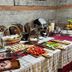 Brilant Antik Hotel in Tirana breakfast buffet with assorted meats, pastries, fruit, and coffee station