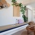Arkasa Palace in Arkása: bright room with daybed, kitchenette, plant decor and seating area