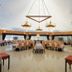 Latanya Park Resort in Bodrum dining hall with chandeliers and neatly set tables under a tented ceiling