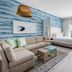 Hyatt Place Panama City Beach/Beachfront room with sofa, bed and ocean-view balcony