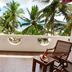 Oasey Beach Hotel in Bentota balcony with palm tree and tropical garden view