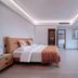 Huatian Century Hotel Liuzhou guest room with king bed, modern lighting, and open layout