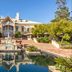 InterContinental Sanctuary Cove Resort in Hope Island with a reflecting pool and grand resort entrance