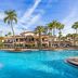 Sheraton Vistana Villages Resort Villas, I-Drive/Orlando in Orlando with a tropical pool and palm trees