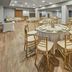City Express Plus by Marriott Tijuana banquet hall with round tables and gold chairs
