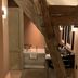 B&B The Verhaegen in Ghent bathroom with freestanding tub and rustic exposed beam